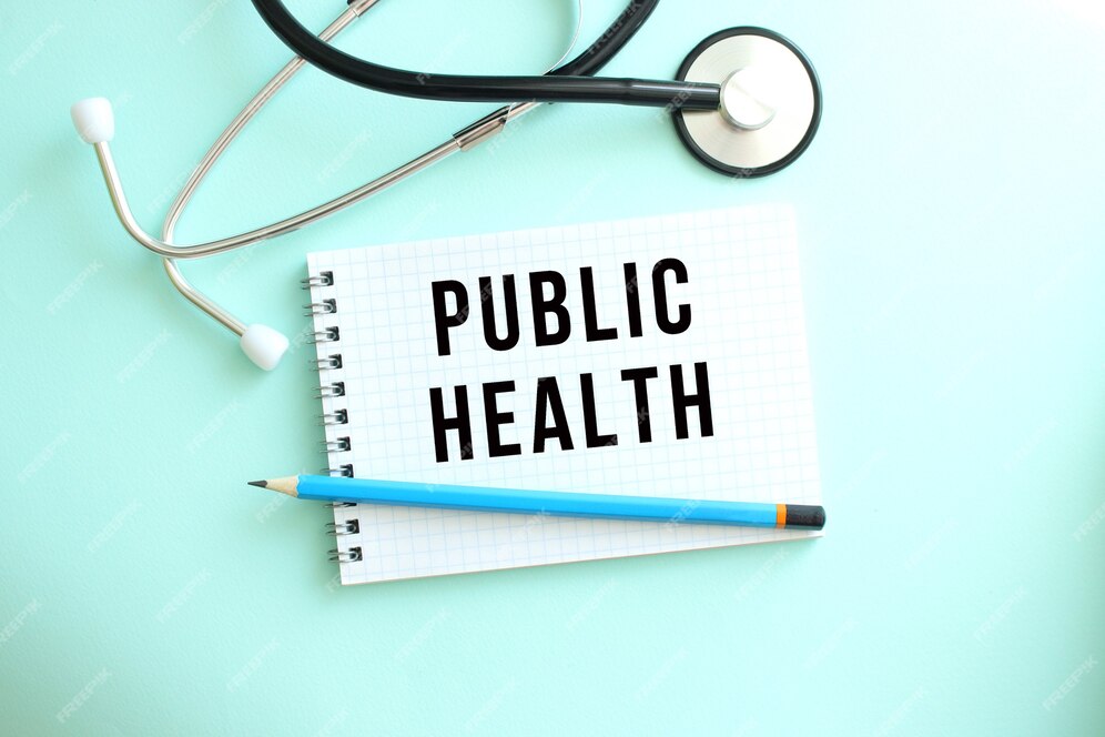 white-notepad-with-words-public-health-stethoscope-blue-background_284815-3720